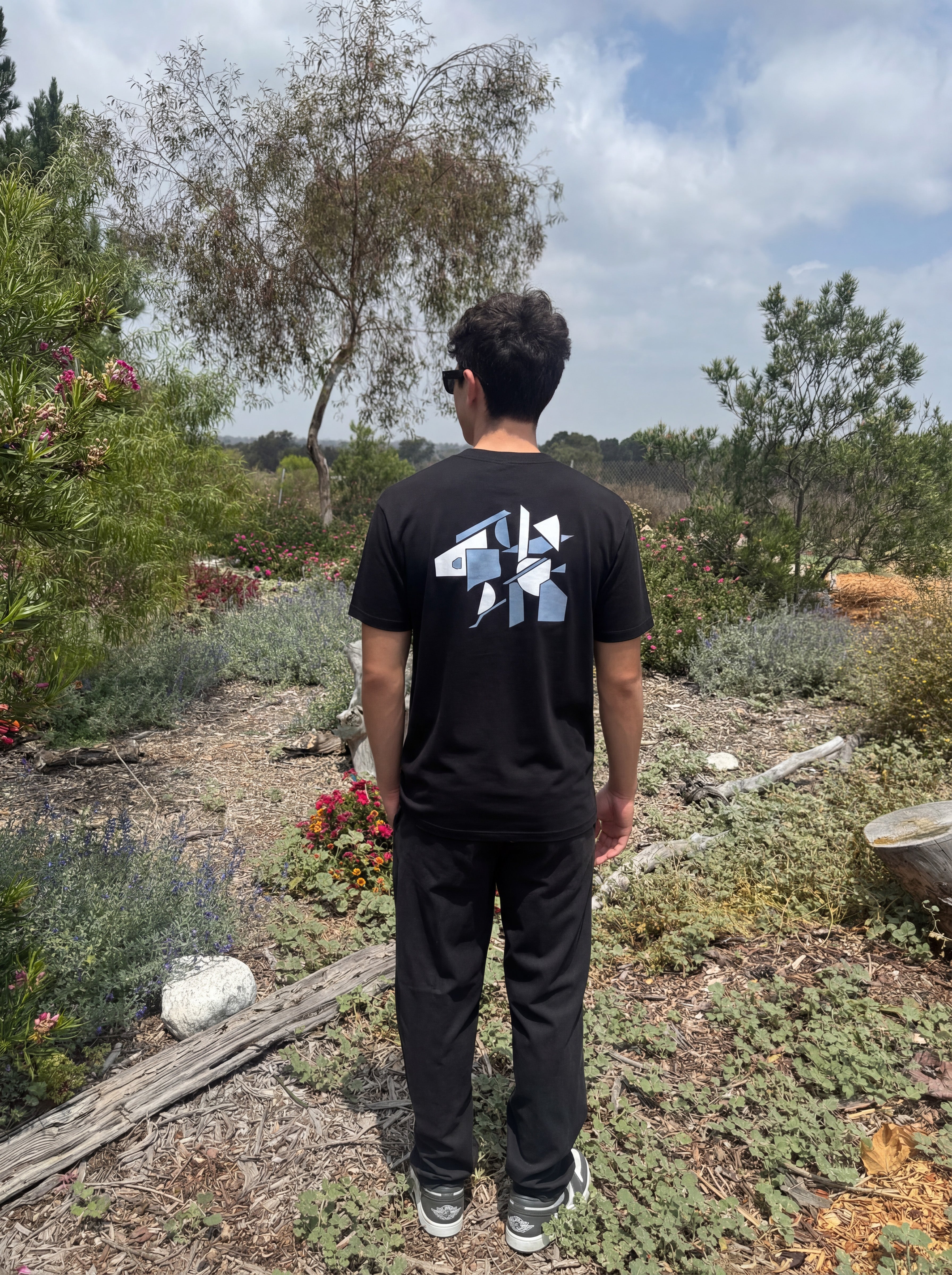 Black crew-neck T-shirt with large back graphic print