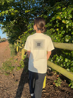 Light bone crew-neck tee with back square geometric logo patch