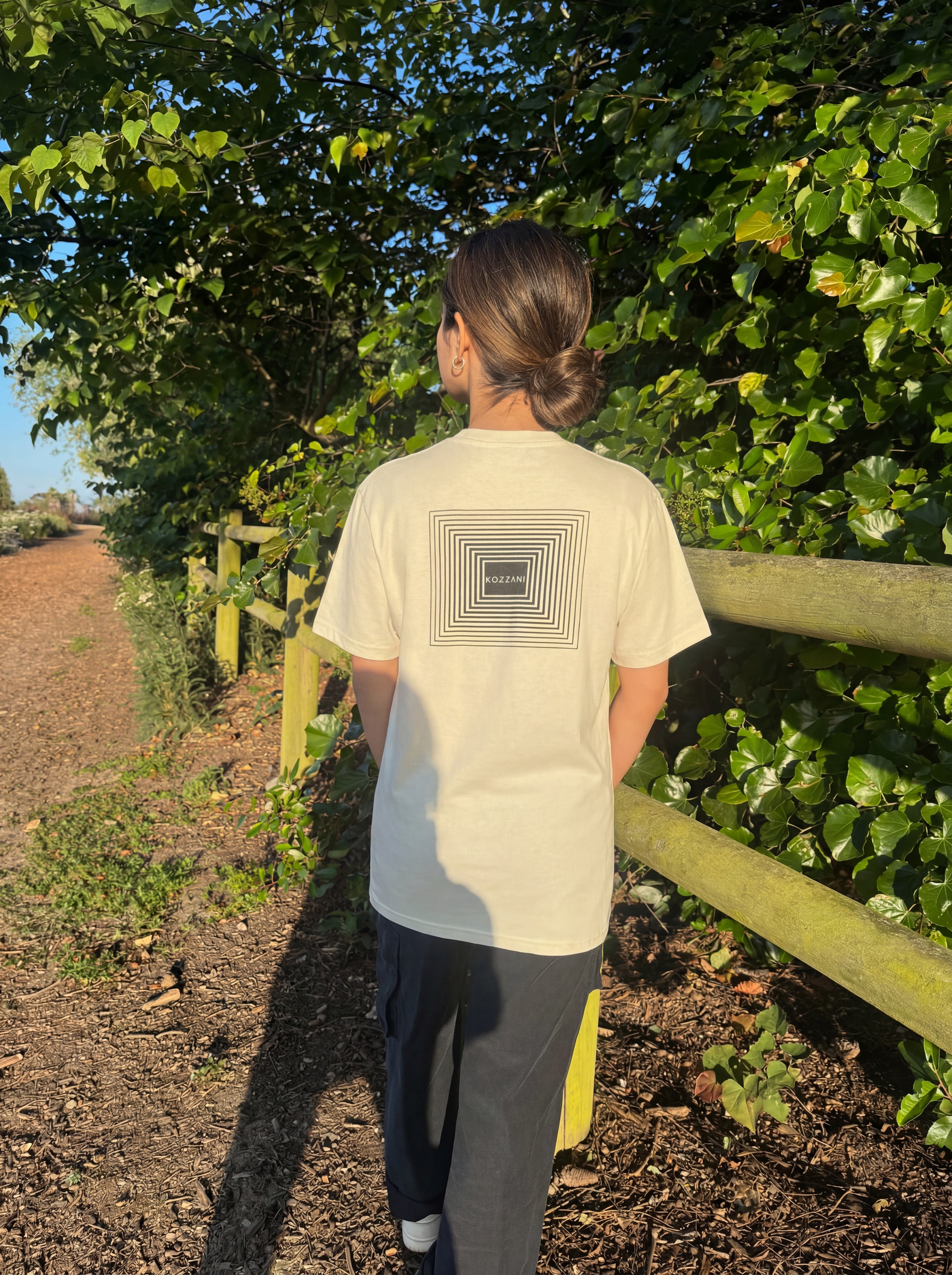 Light bone crew-neck tee with back square geometric logo patch