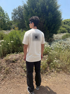 Bone crew-neck tee with back square geometric logo patch