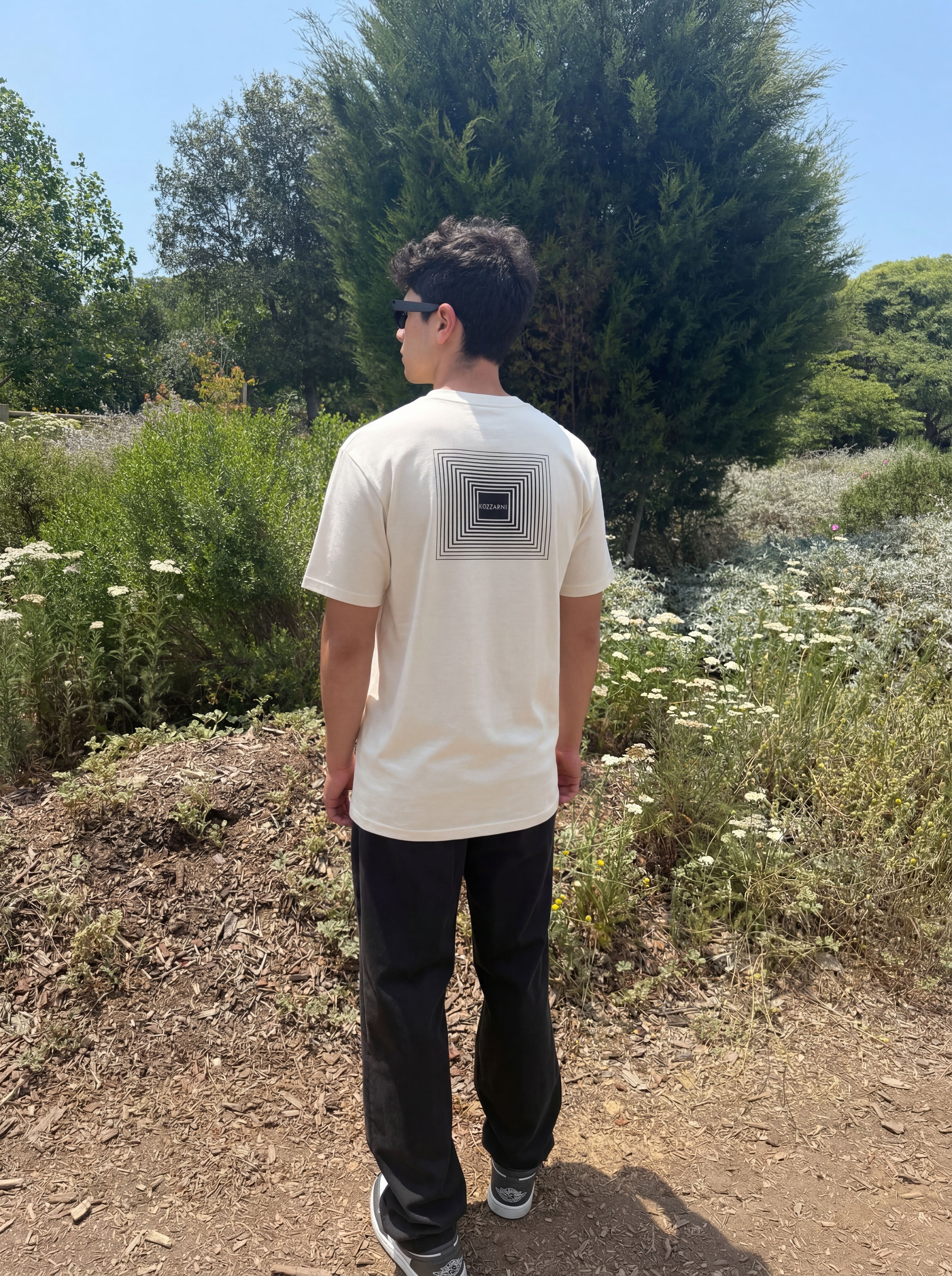 Bone crew-neck tee with back square geometric logo patch