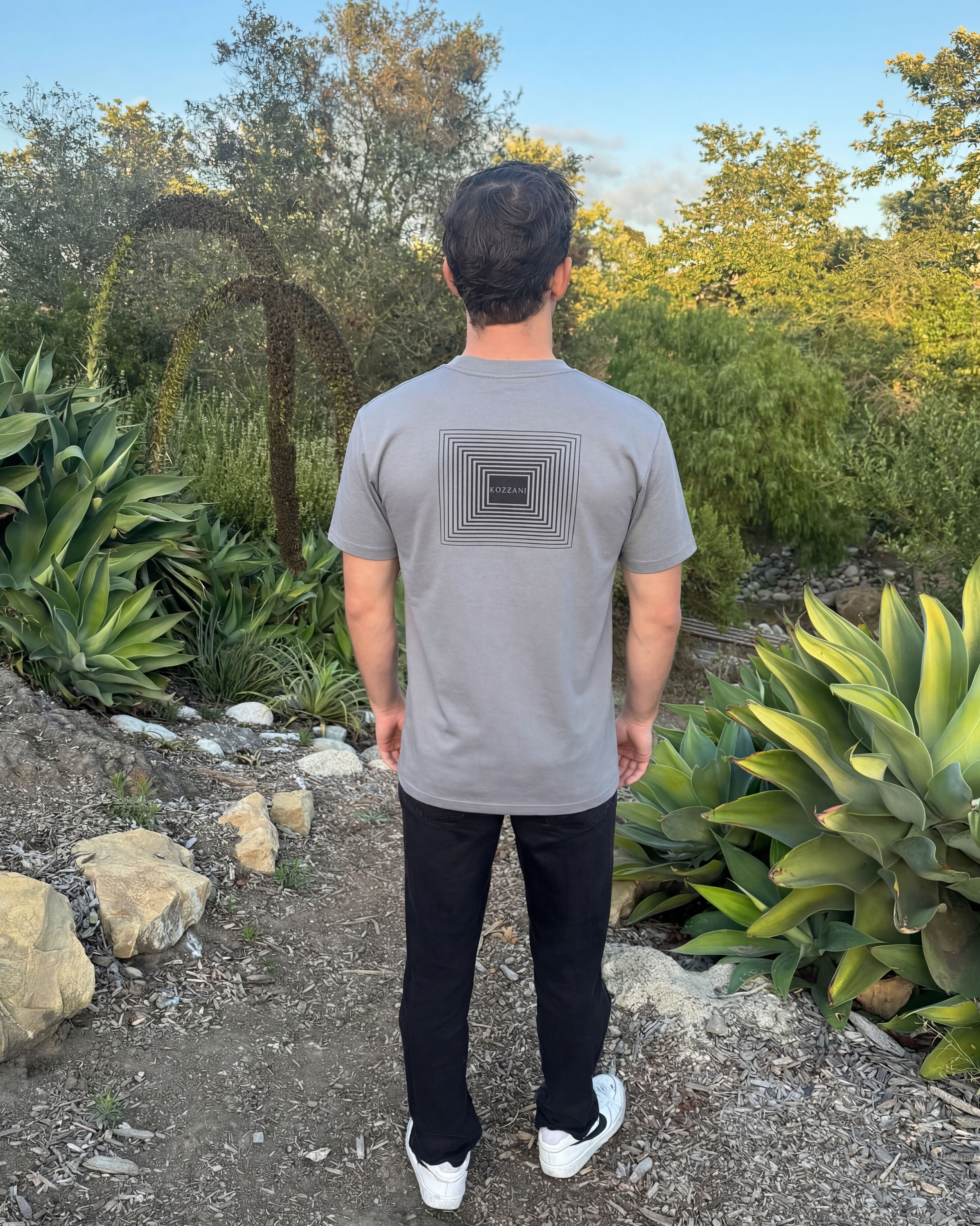 Gray crew-neck tee with back square geometric logo patch