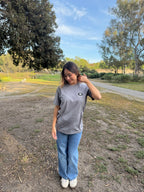 Gray graphic T-shirt with small chest logo, crew neck, short sleeves