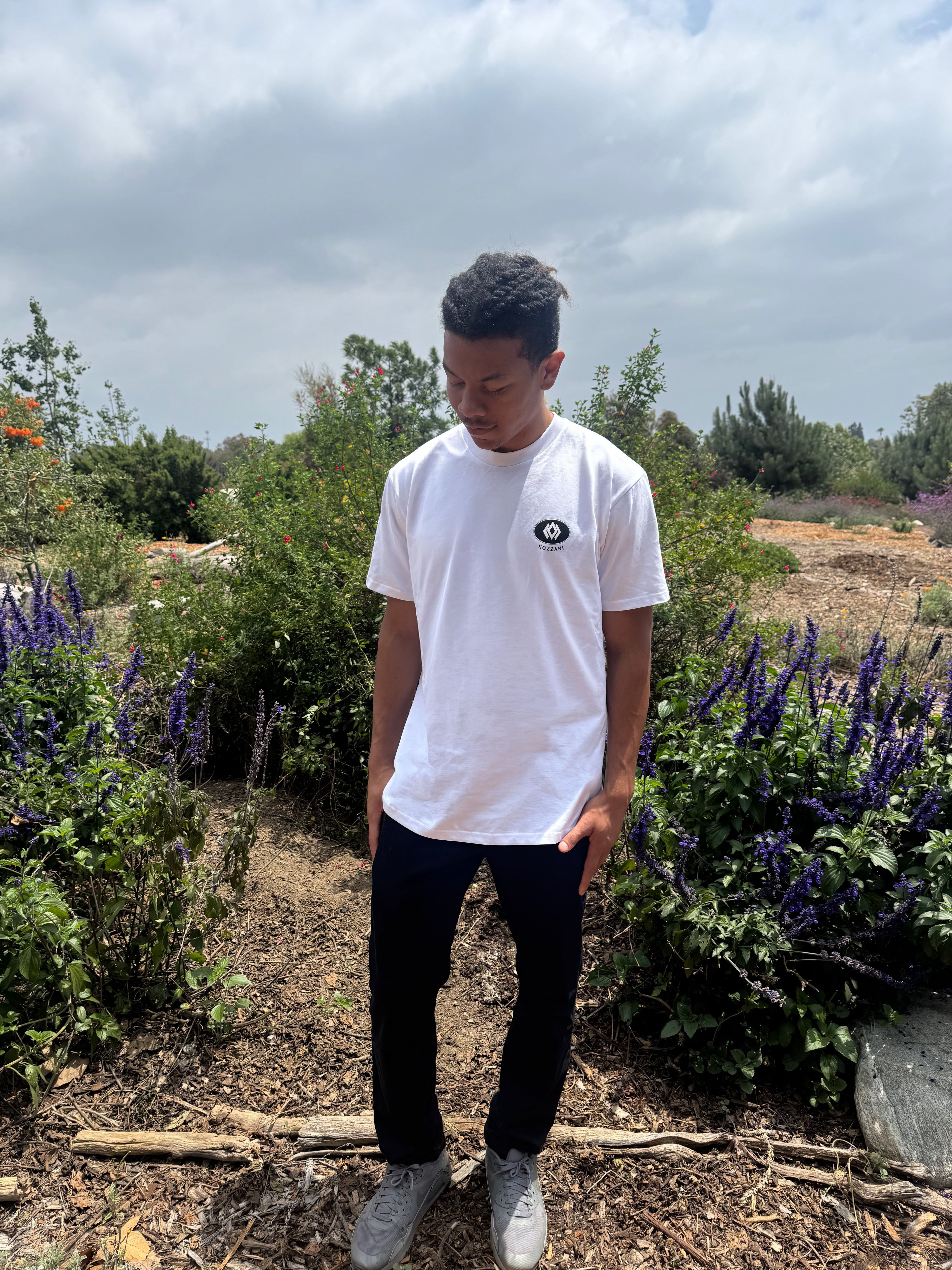 White T-shirt with small chest logo, crew neck, short sleeves